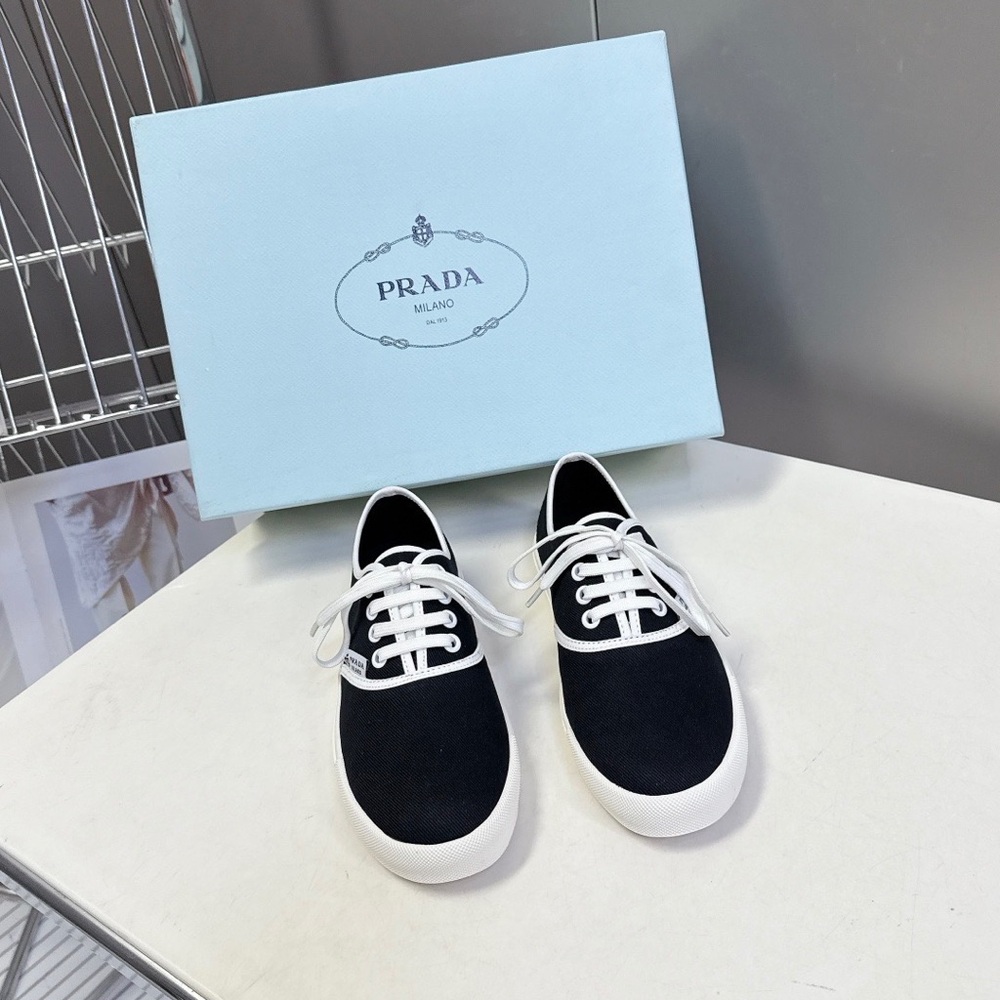 Prada Women's Black and White Sneakers